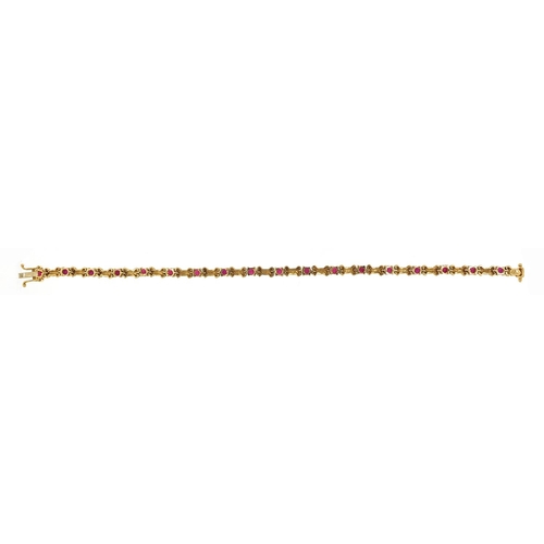 648 - 18ct gold ruby and diamond bracelet, 19cm in length, 12.4g