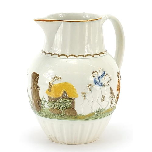 82 - Late 18th century Prattware jug decorated in relief with huntsmen on horseback and hounds, 18cm high