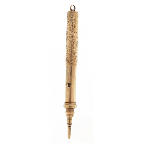 507 - 9ct gold propelling pencil with engraved decoration, 7cm in length extended, 6.3g