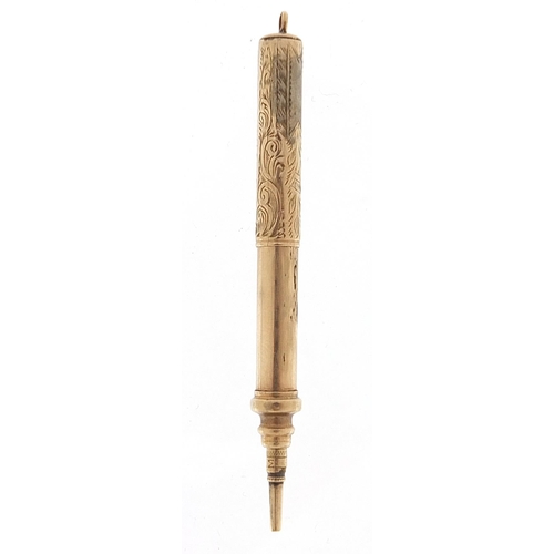 507 - 9ct gold propelling pencil with engraved decoration, 7cm in length extended, 6.3g