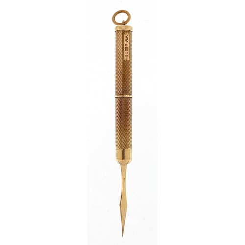 506 - 9ct gold engine turned propelling toothpick, 7.5cm in length extended, 6.7g