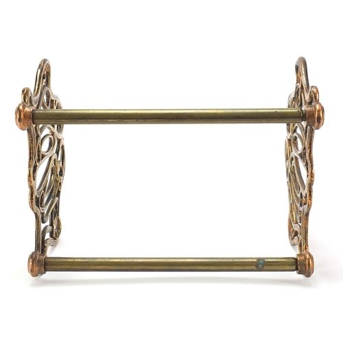 326 - Art Nouveau coppered brass sliding book rack, 21cm adjusting to 36cm