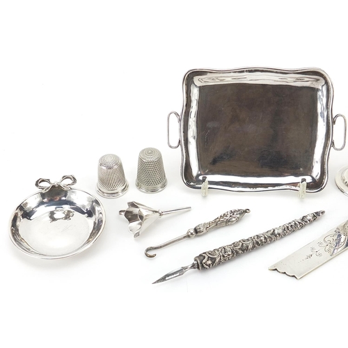 259 - Silver objects including a miniature twin handled tray, masonic jewel, pill box and thimbles, the la... 