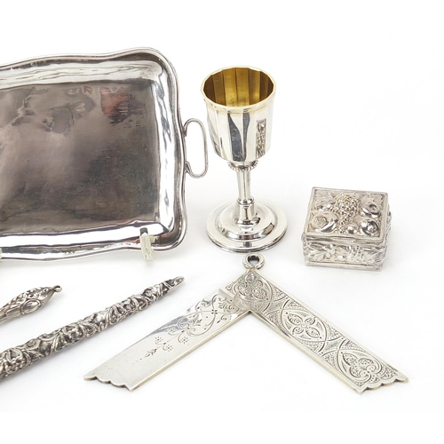 259 - Silver objects including a miniature twin handled tray, masonic jewel, pill box and thimbles, the la... 