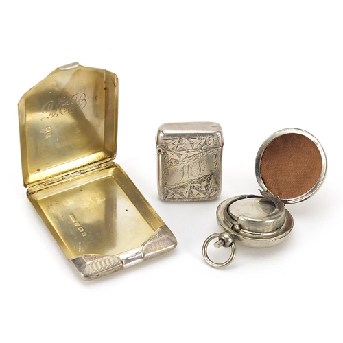 260 - Two Victorian and later silver vestas and a silver plated sovereign case, the largest 6cm in length,... 