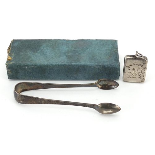 314 - Victorian silver stamp case with gilt interior and a pair of silver sugar tongs, the stamp case reta... 