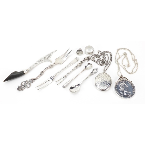 379 - Silver jewellery and objects including locket with necklace, forks, letter opener and a Churchill co... 