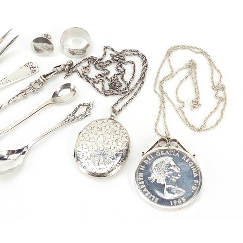 379 - Silver jewellery and objects including locket with necklace, forks, letter opener and a Churchill co... 