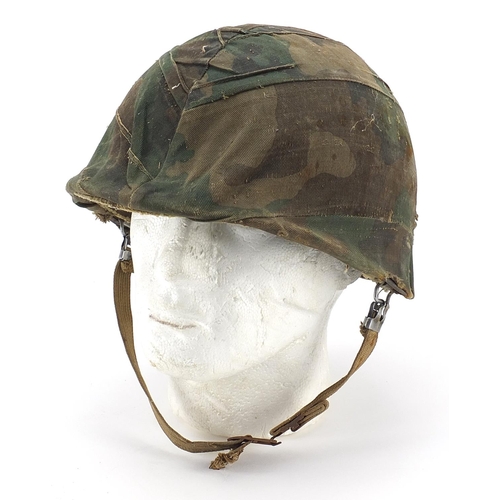 479 - Military interest USM1 helmet with camouflage cover