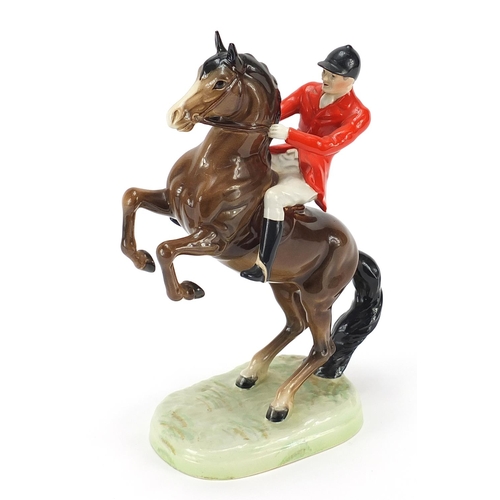 391 - Beswick huntsman on rearing horse, numbered 868, 24cm high