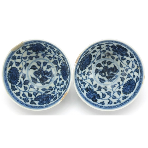 304 - Pair of Chinese blue and white porcelain bowls hand painted with flowers, four figure character mark... 