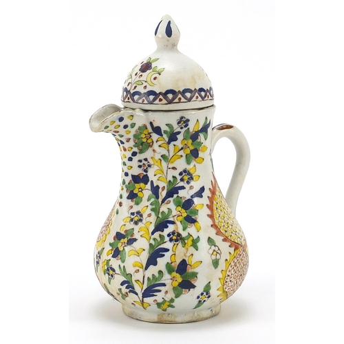 104 - Turkish Kutahya pottery pot hand painted with flowers, 22.5cm high