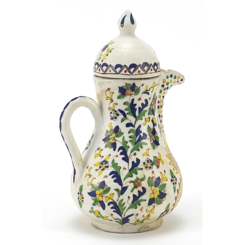 104 - Turkish Kutahya pottery pot hand painted with flowers, 22.5cm high