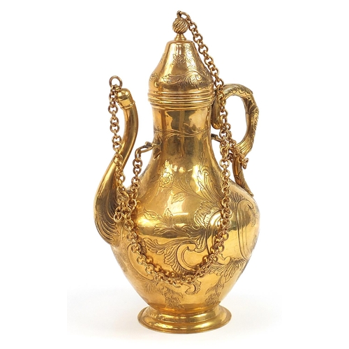 165 - Turkish Tombak ewer engraved with flowers, 37cm high