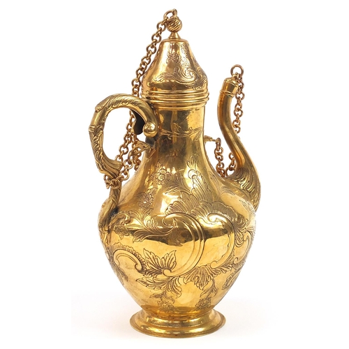 165 - Turkish Tombak ewer engraved with flowers, 37cm high