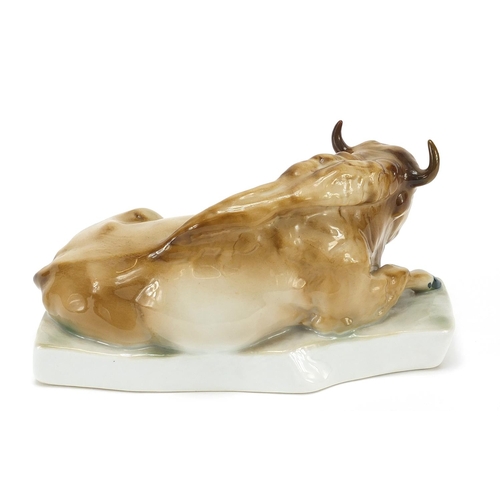 394 - Zsolnay Pecs, Hungarian porcelain recumbent bison, 20cm in length