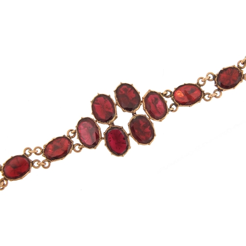 637 - Antique 9ct rose gold garnet bracelet, 16cm in length, 6.5g