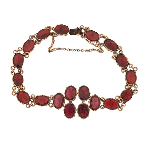 637 - Antique 9ct rose gold garnet bracelet, 16cm in length, 6.5g