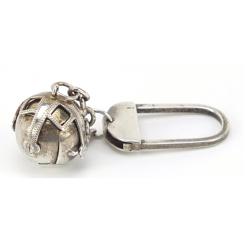 918 - Silver folding masonic ball pendant keyring, London import marks, the ball 5cm when open, overall 11... 