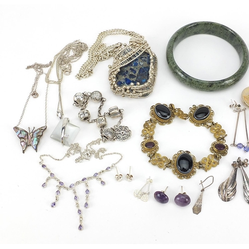 958 - Antique and later jewellery, mostly silver, including a large lapis lazuli pendant, Chinese jade ban... 