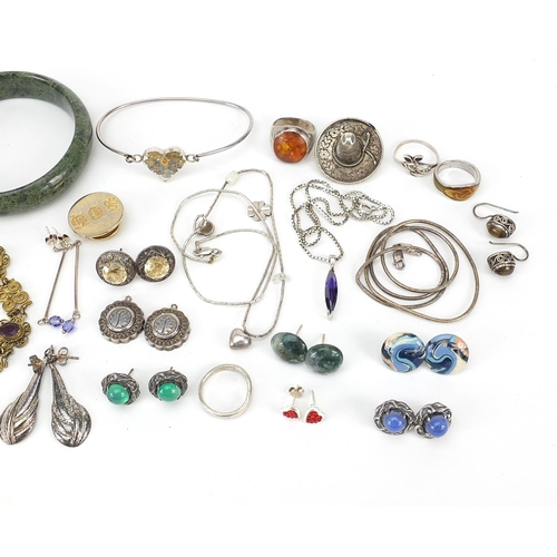 958 - Antique and later jewellery, mostly silver, including a large lapis lazuli pendant, Chinese jade ban... 