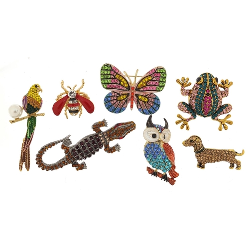 954 - Seven jewelled and enamel animal and insect brooches including a bird with simulated pearl and artic... 