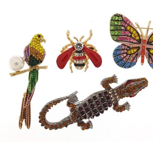 954 - Seven jewelled and enamel animal and insect brooches including a bird with simulated pearl and artic... 