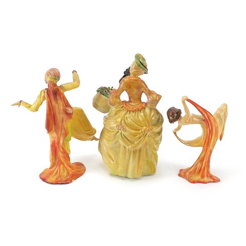 201 - Three Wade cellulose figurines of Art Deco females, the largest 25.5cm high