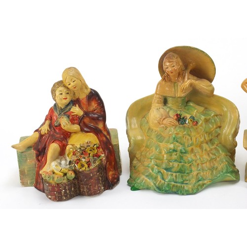 239 - Four Wade cellulose figurines of Art Deco females, the largest 19cm high