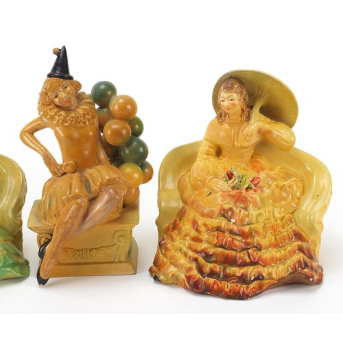 239 - Four Wade cellulose figurines of Art Deco females, the largest 19cm high