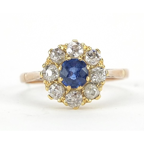 646 - Unmarked gold diamond and sapphire cluster ring, size S, 2.9g