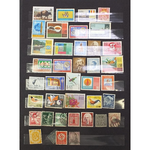 1919 - World stamps arranged in an album including mint, Cinderella and fiscal examples