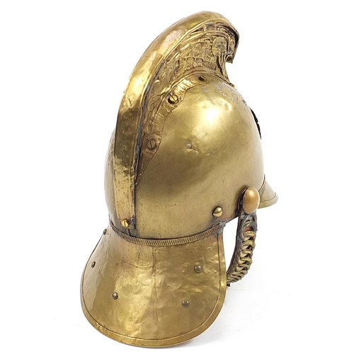 480 - Antique brass Merryweather type fireman's helmet with chinstrap