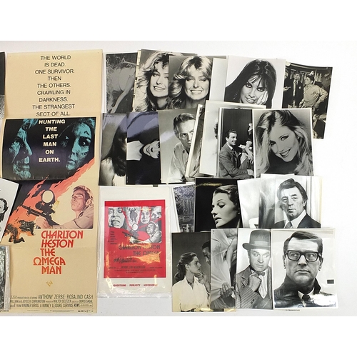 539 - Collection of vintage and later film stills and lobby cards including The Omega Man and Airport 1975