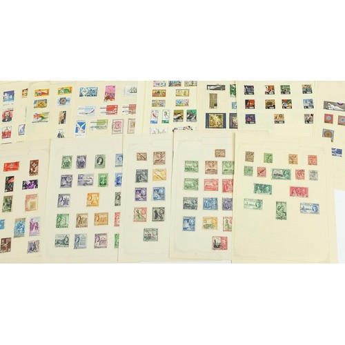 1904 - Commonwealth, Malta, Mauritius and Malawi stamps arranged on several pages