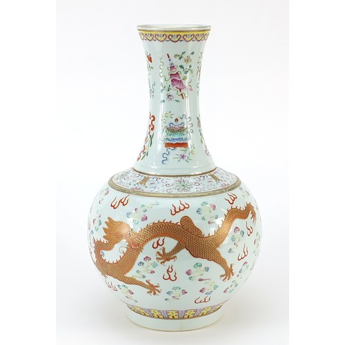 265 - Large Chinese porcelain vase hand painted in the famille rose palette with dragons chasing a flaming... 