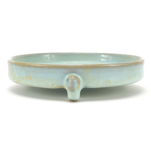 226 - Chinese porcelain tripod censer having a celadon glaze, 14.5cm in diameter