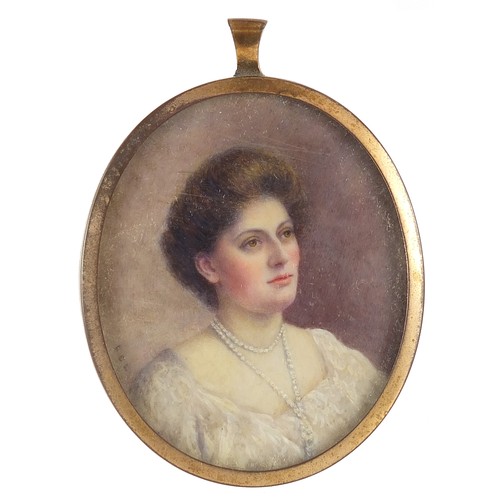 285 - Two Edwardian oval portrait miniatures of females, housed in pendant mounts, one unmarked silver, ea... 