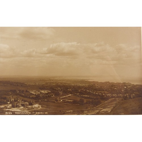 365 - Collection of Eastbourne and surrounding postcards arranged in three albums, some black and white ph... 