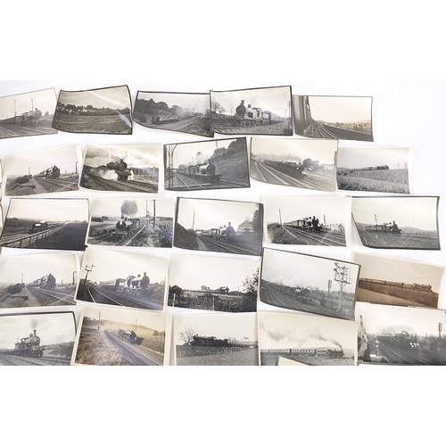 357 - Collection of 1930's and later railwayana interest black and white photographs and postcards arrange... 