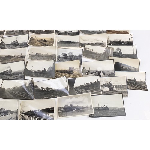 357 - Collection of 1930's and later railwayana interest black and white photographs and postcards arrange... 