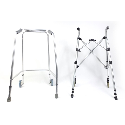 295 - Two metal mobility aids, one foldable, each with wheels, each 89cm high