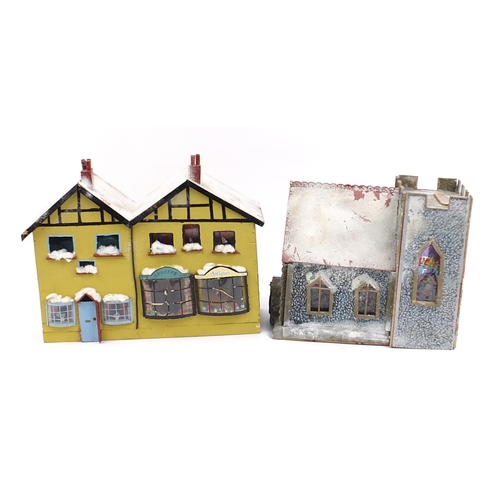 46 - Snowy covered wooden model of a church with antique and grocery shop and interior lights, the church... 