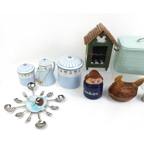 51 - Quantity of kitchenalia including enamel bread bin, matching jug, wooden chicken egg stand, pottery ... 