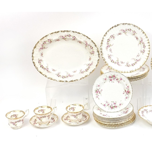 64 - Royal Albert Dimiti Rose tea and dinner ware including a large platter, the platter 35cm in diameter