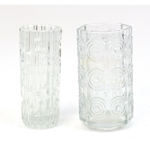 12 - Retro bark design glass vase together with a retro circular glass vase, each 20cm high