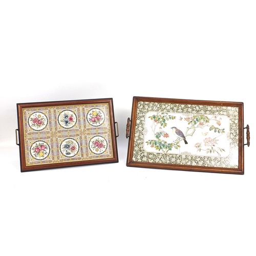 259 - Mahogany tiled tray with a Victorian oak ceramic panelled tray decorated with birds, the largest 63c... 