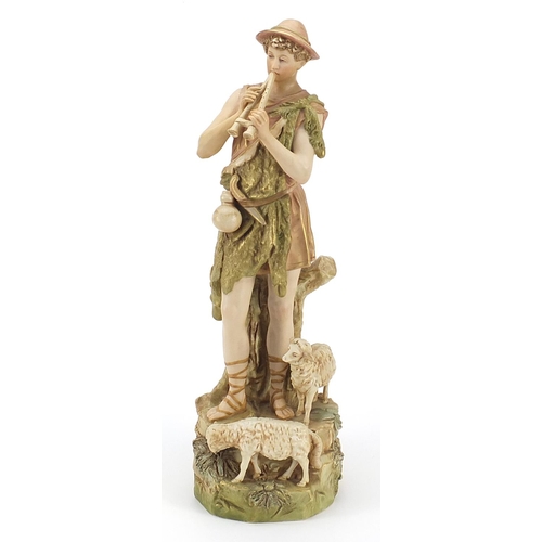 155 - Royal Dux, Art Nouveau Czechoslovakian figure of a shepherd with two sheep, numbered 135 to the base... 