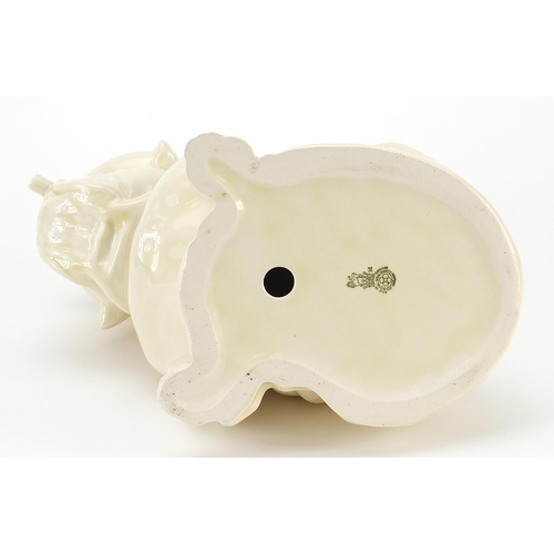 161 - Military interest Royal Doulton smoking Bulldog with Union Jack Flag, 21cm in length