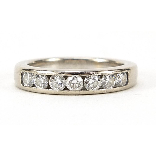 855 - 18ct white gold diamond half eternity ring, size I/J, 4.9g